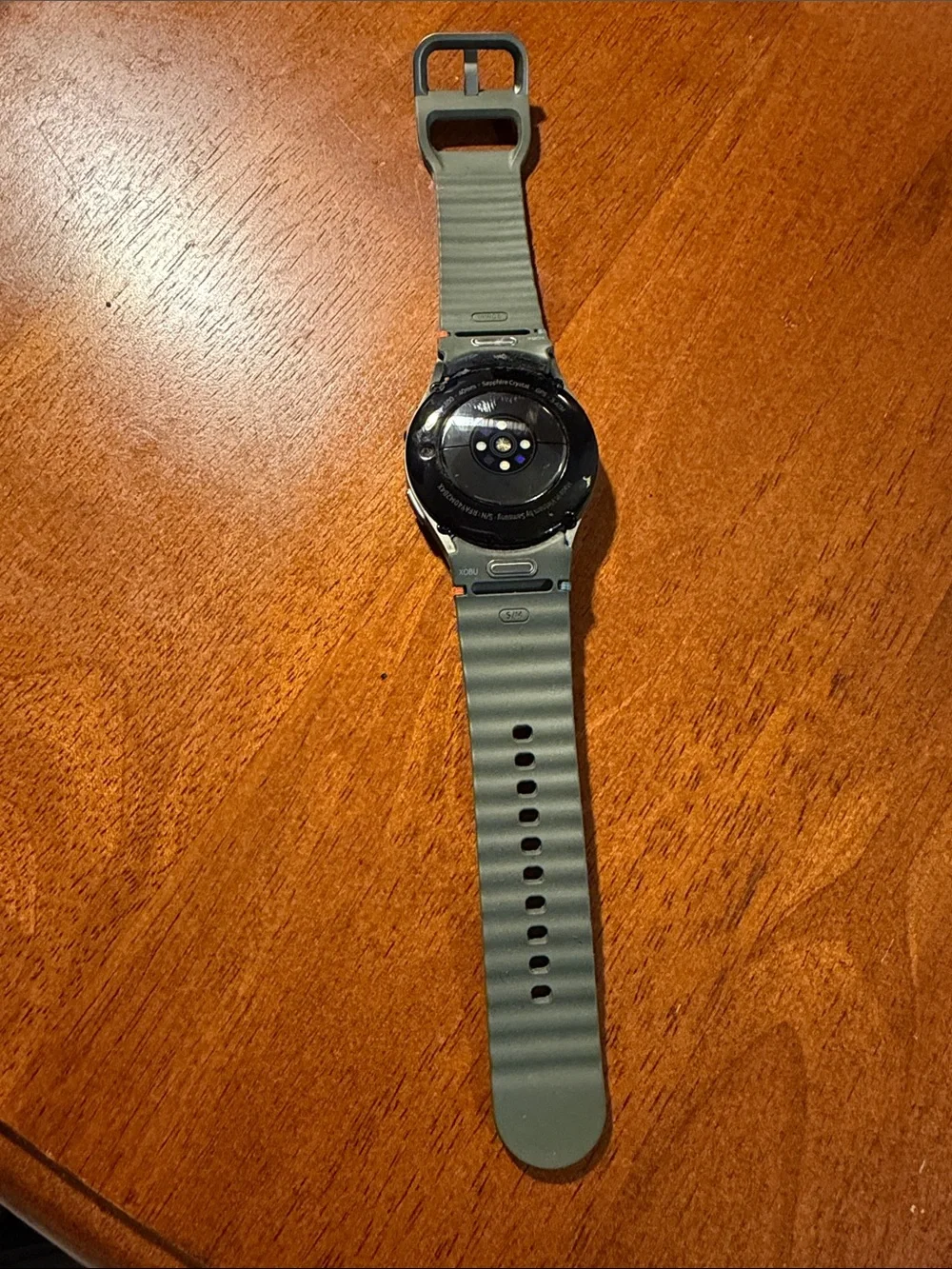 Samsung Round Smartwatch with Olive Green Silicone Strap and Silver Case